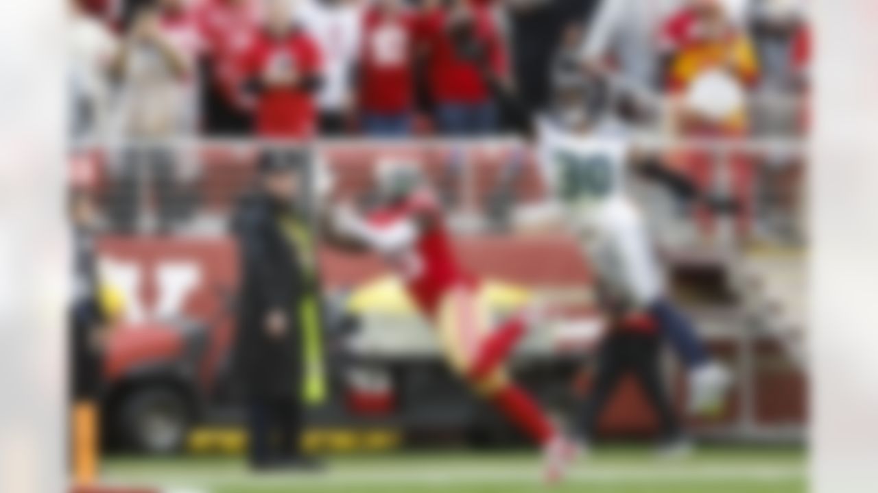 Seattle Seahawks cornerback Mike Jackson (30) tips the ball during an NFL Super Wild Card Weekend playoff game against the San Francisco 49ers on Saturday, January 14, 2023 in Santa Clara, California.