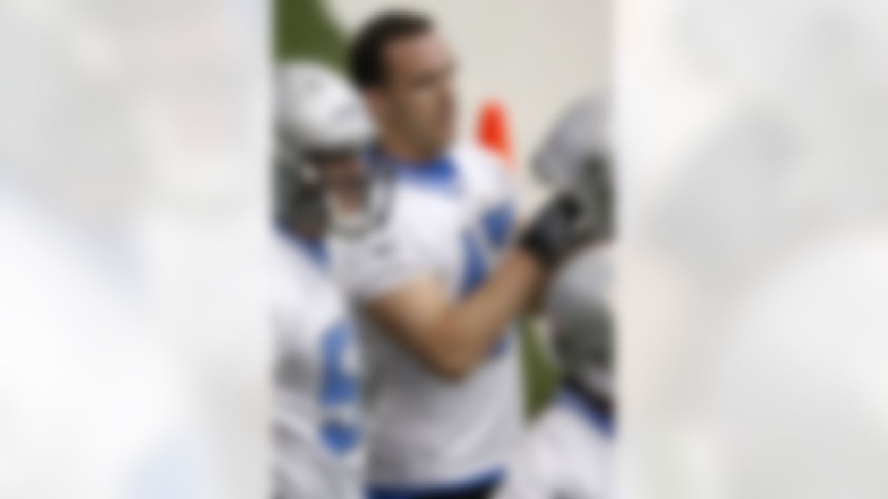 ALLEN PARK, MI - MAY 03: Caleb Campbell #47 of the Detroit Lions puts on his helmet during rookie training camp at the Detroit Lions Headquarters and Training Facility on May 3, 2008 in Allen Park, Michigan. (Photo by Gregory Shamus/Getty Images)