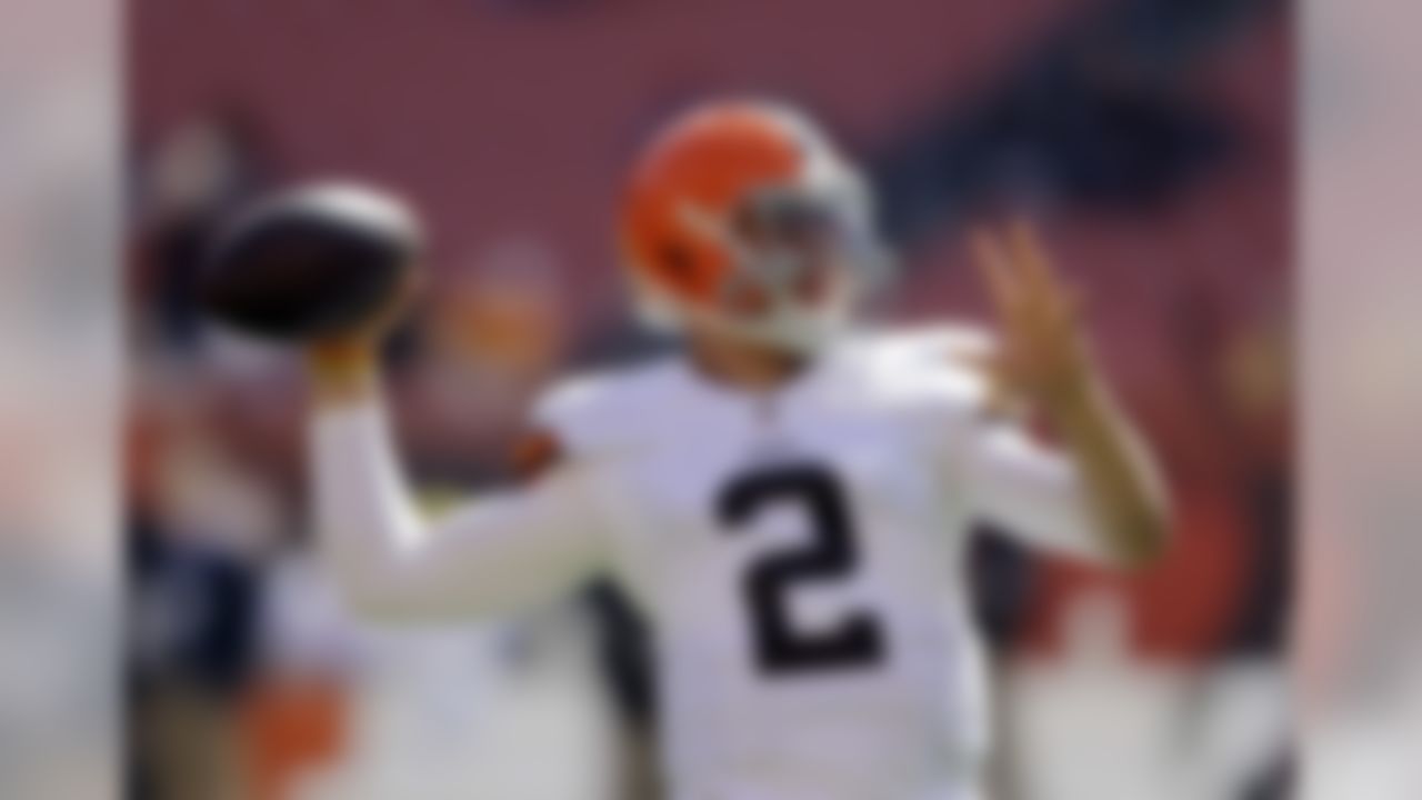 Cleveland Browns quarterback Johnny Manziel warms up before an NFL football game against the Baltimore Ravens, Sunday, Sept. 21, 2014, in Cleveland. (AP Photo/Tony Dejak)
