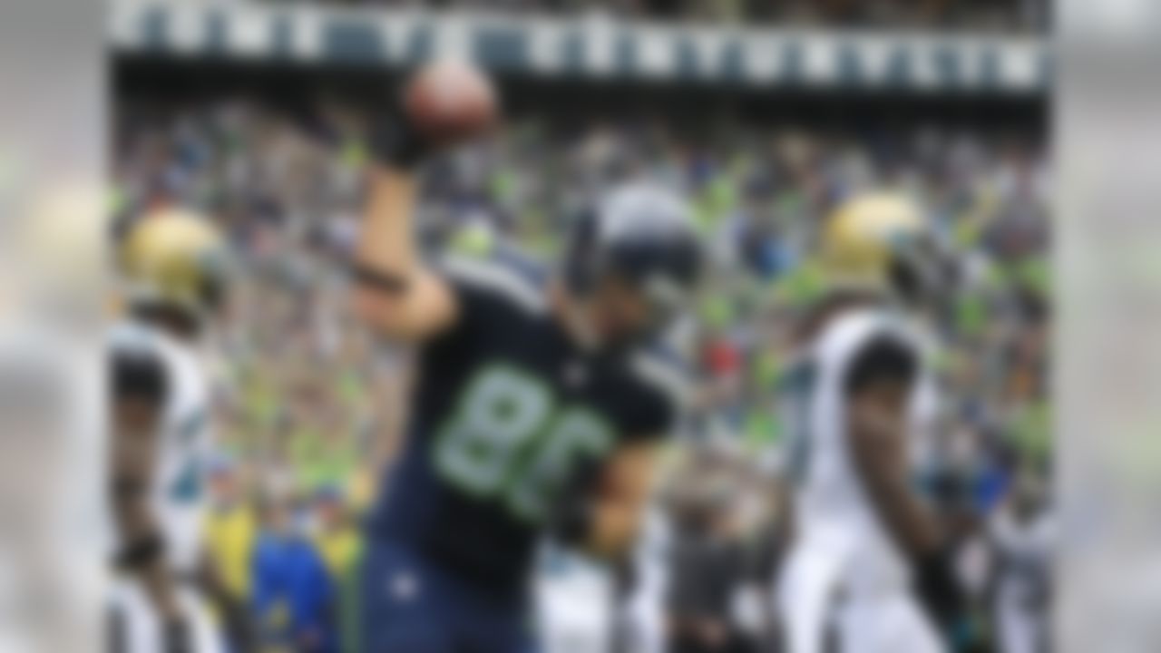 Seattle Seahawks' Zach Miller reacts after scoring his second touchdown reception against the Jacksonville Jaguars in the first half of an NFL football game on Sunday, Sept. 22, 2013, in Seattle. (AP Photo/Stephen Brashear)