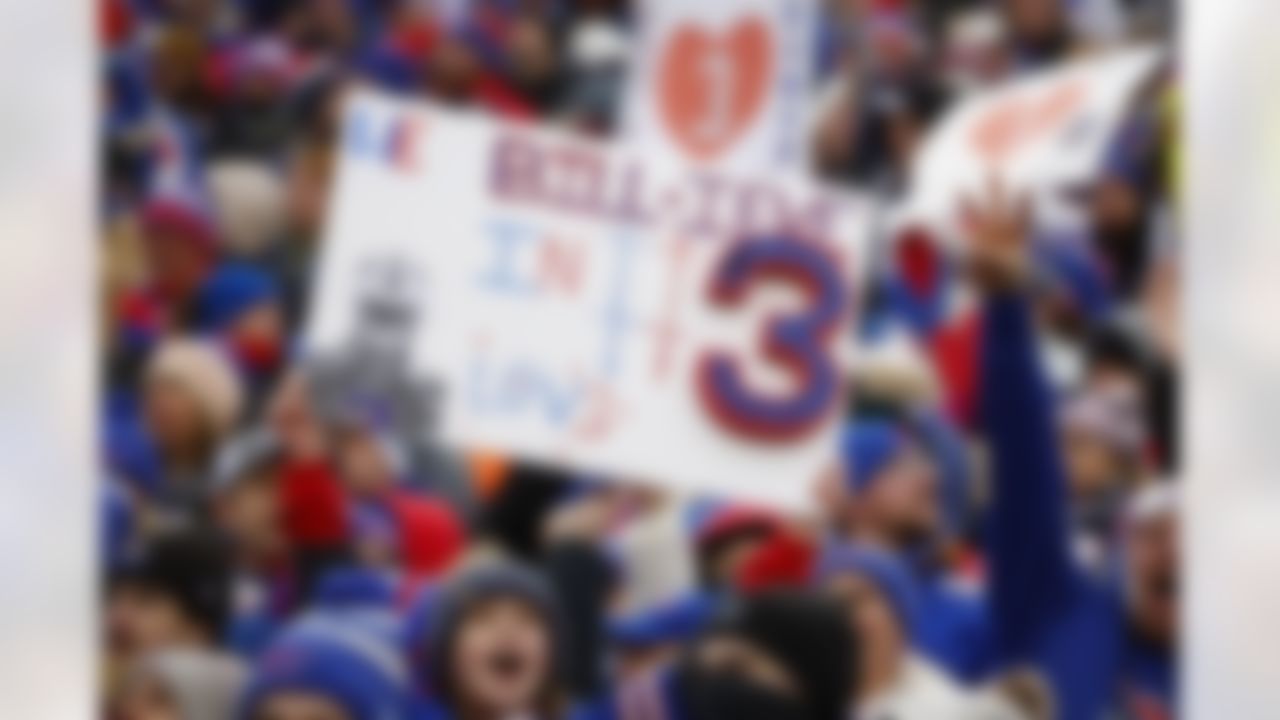 Fans hold signs in support of Buffalo Bills safety Damar Hamlin during the second half of an NFL football game, against the New England Patriots, Sunday, Jan. 8, 2023, in Orchard Park. Hamlin remains hospitalized after suffering a catastrophic on-field collapse in the team's previous game against the Cincinnati Bengals.