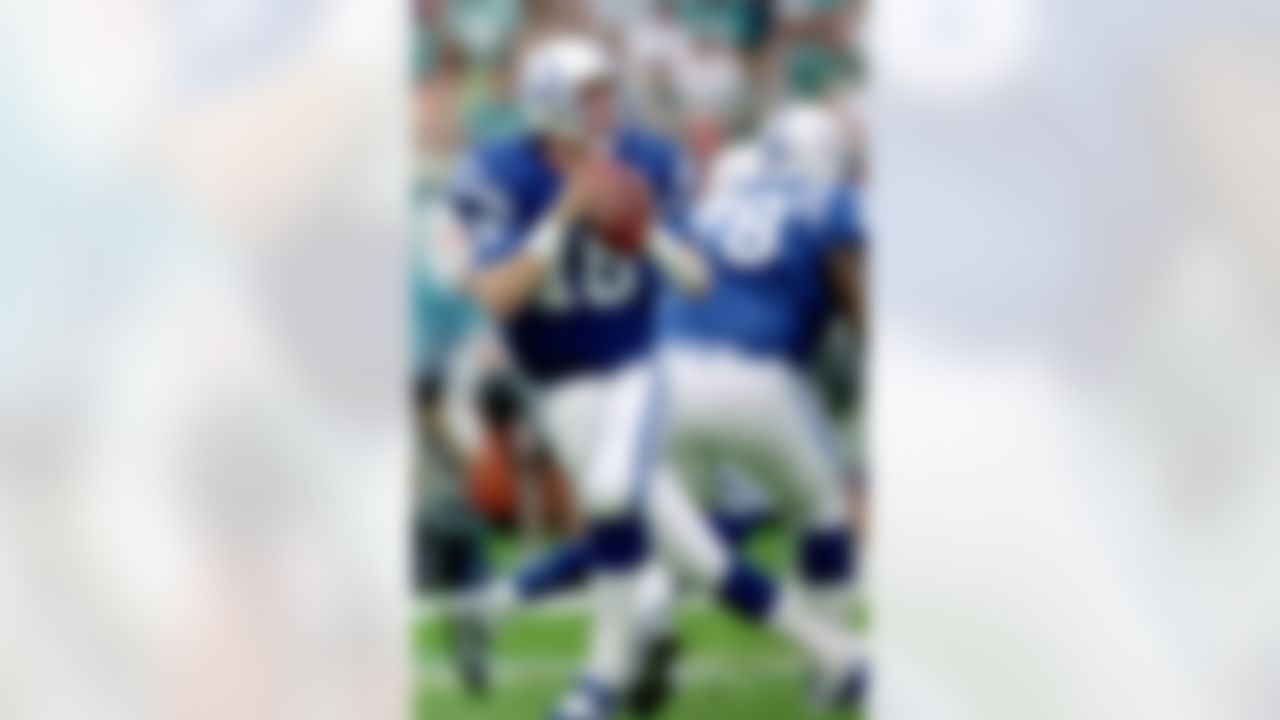 5 Dec 1999: Peyton Manning #18 of the Indianapolis Colts moves back to pass the ball during a game against the Miami Dolphins at the Pro Player Stadium in Miami, Florida. The Colts defeated the Dolphins 37-34. Photo by Eliot J. Schechter/Getty Images.