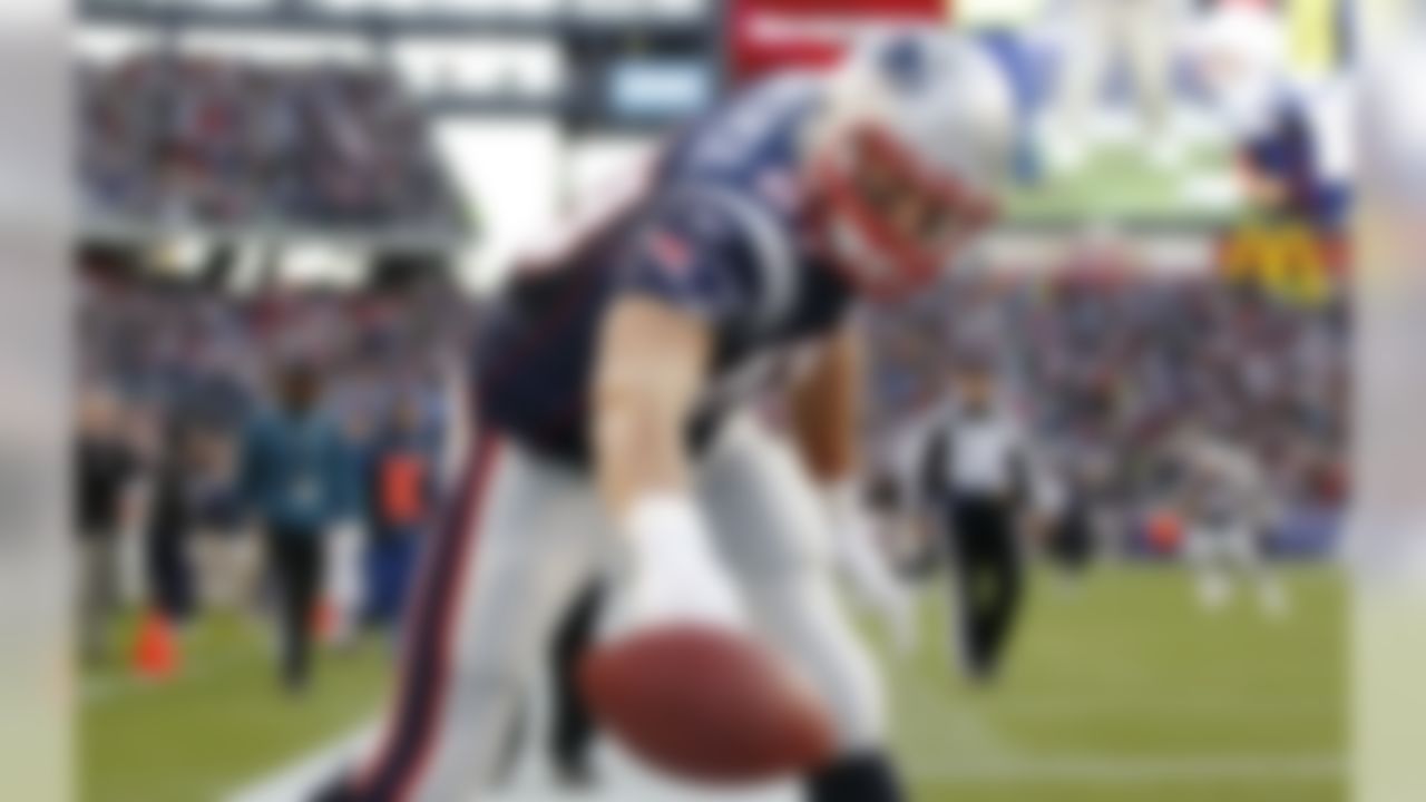 New England Patriots tight end Rob Gronkowski spikes the ball after his touchdown against the Buffalo Bills in the third quarter of an NFL football game in Foxborough, Mass., Sunday Jan. 1, 2012. (AP Photo/Elise Amendola)