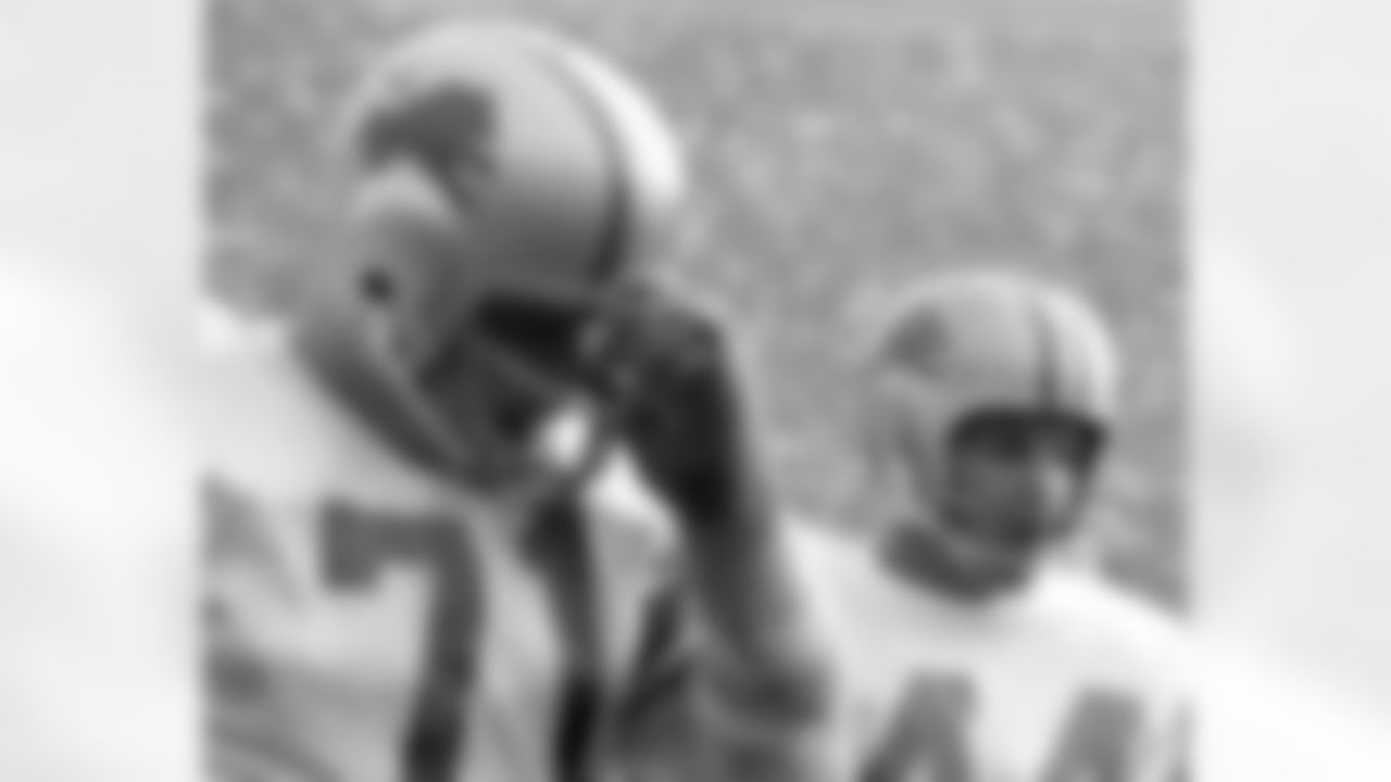 Detroit Lions defensive tackle Alex Karras (71) and cornerback Dick LeBeau (44) during the Lions 28-10 victory over the Los Angeles Rams on October 29, 1961 at the Los Angeles Memorial Coliseum in Los Angeles, California. (National Football League)