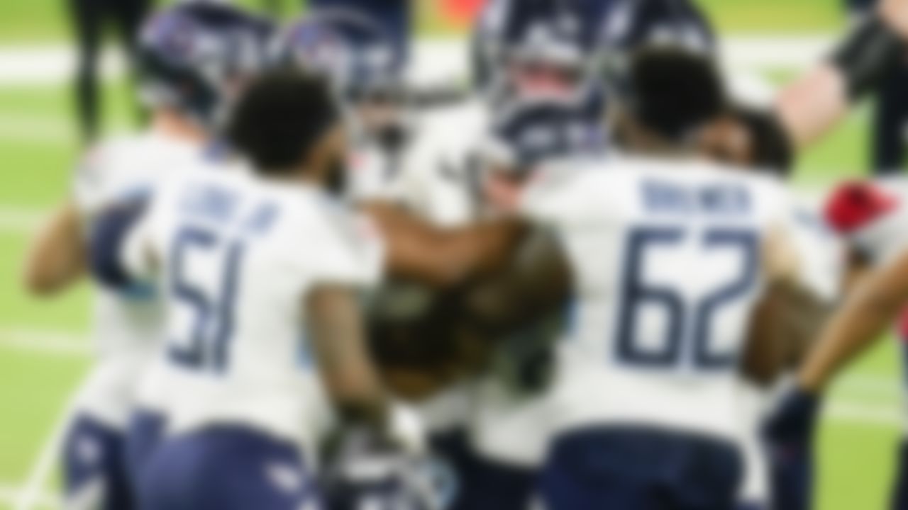 Tennessee Titans kicker Sam Sloman (center) boots the game-winning field goal against the Houston Texans.