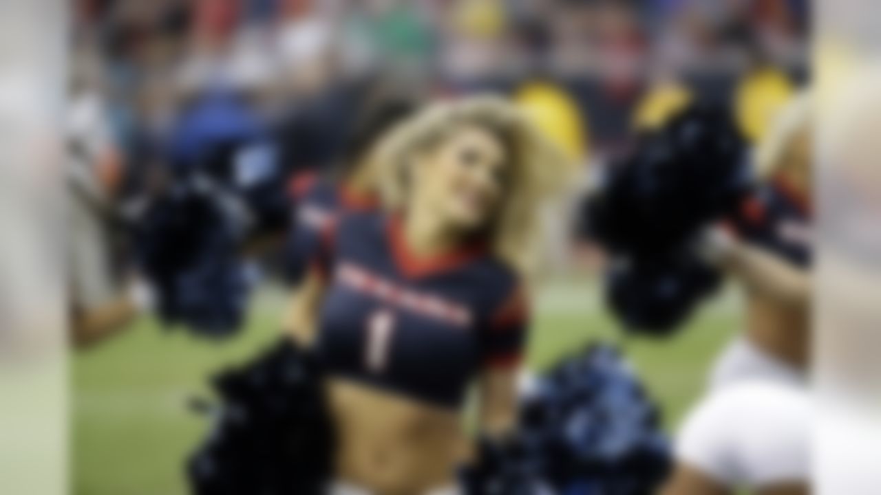 Houston Texans cheerleaders perform during the fourth quarter of an NFL football game against the Jacksonville Jaguars Sunday, Nov. 24, 2013, in Houston. The Jaguars won 13-6. (AP Photo/David J. Phillip)