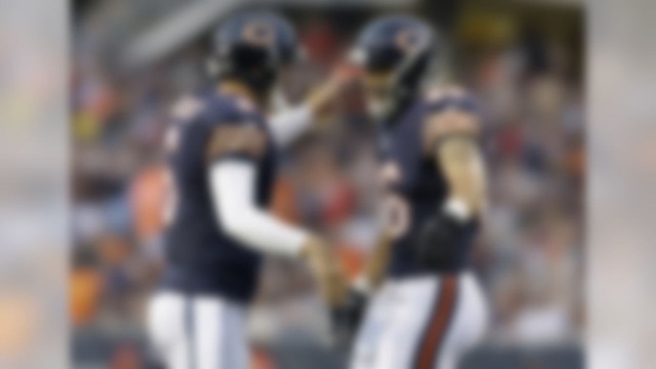 Chicago Bears quarterback Jay Cutler (6) celebrates a touchdown with tight end Zach Miller (86) in the first half of an NFL preseason football game against the Philadelphia Eagles on Friday, Aug. 8, 2014, in Chicago. (AP Photo/Nam Y. Huh)