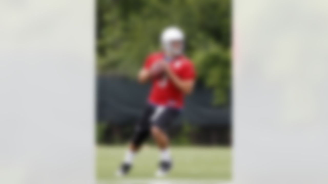Detroit Lions quarterback Matthew Stafford practices during NFL football minicamp at the teams' training facility in Allen Park, Mich., Thursday, June 24, 2010. (AP Photo/Carlos Osorio)