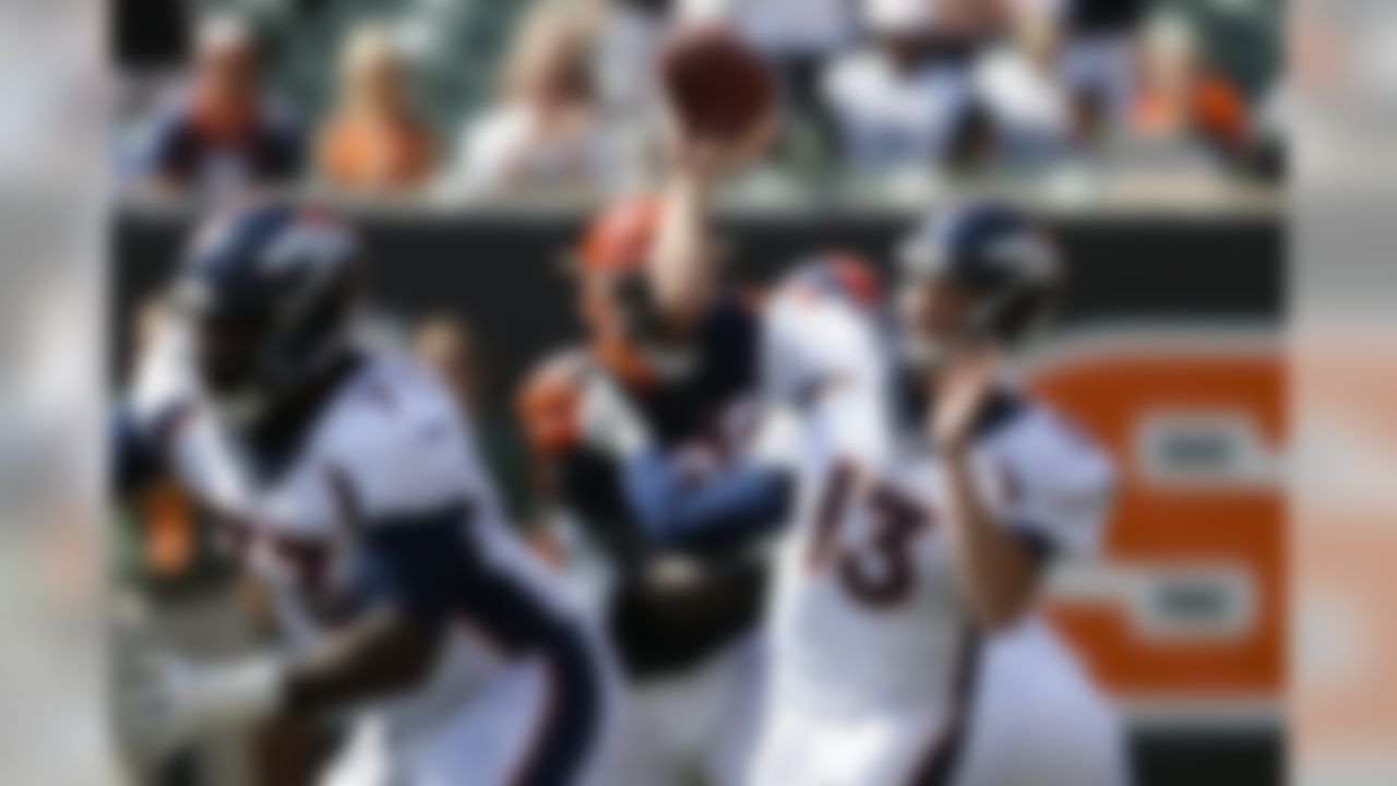 Denver Broncos quarterback Trevor Siemian (13) throws during the first half of an NFL football game against the Cincinnati Bengals, Sunday, Sept. 25, 2016, in Cincinnati. (AP Photo/Gary Landers)