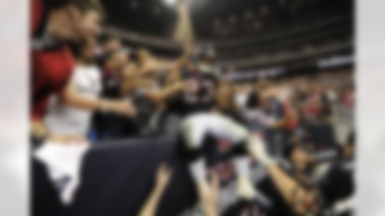 Houston Texans Running back Arian Foster (23) jumps into the stands after scoring a touchdown during a Wildcard Playoff game against the Cincinnati Bengals, Sunday, January 7, 2012 in Houston, TX. (AP Photo/Bill Baptist)