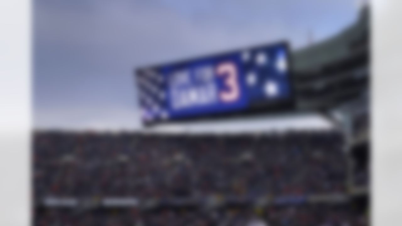 A monitor displays Love for Damar to honor injured Buffalo Bills player Damar Hamlin before an NFL football game between the Chicago Bears and the Minnesota Vikings, Sunday, Jan. 8, 2023, in Chicago.