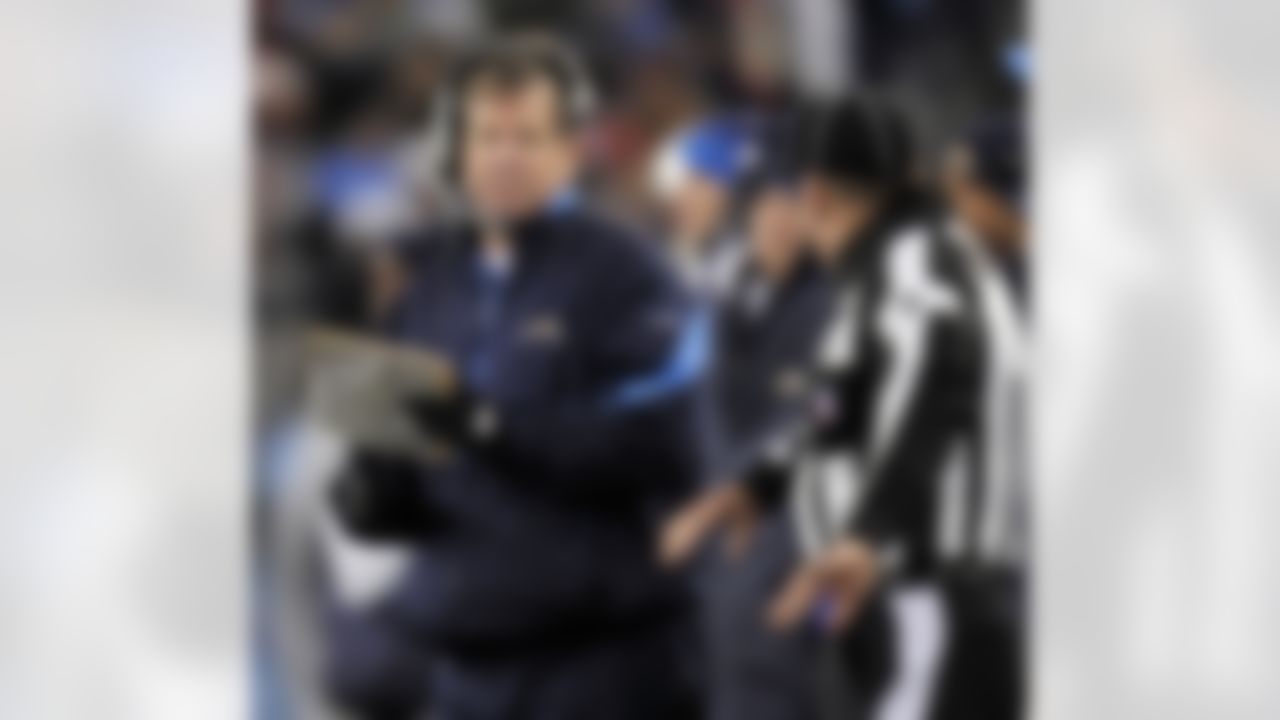San Diego Chargers head coach Norv Turner listens to head linesman John McGrath (5) in the second quarter of an NFL football game against the Tennessee Titans on Friday, Dec. 25, 2009, in Nashville, Tenn. (AP Photo/John Russell)