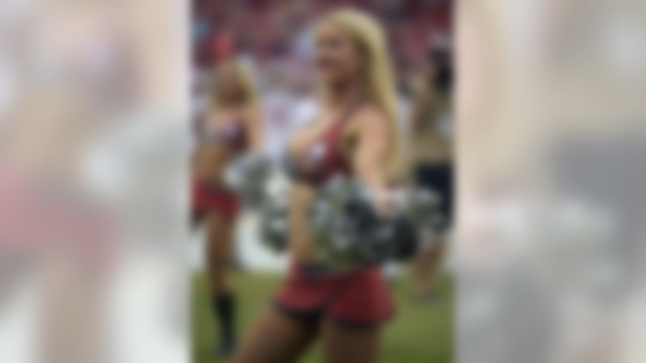 A Tampa Bay Buccaneers cheerleader during the second quarter of an NFL football game against the St. Louis Rams Sunday, Sept. 14, 2014, in Tampa, Fla. (AP Photo/Phelan M. Ebenhack)