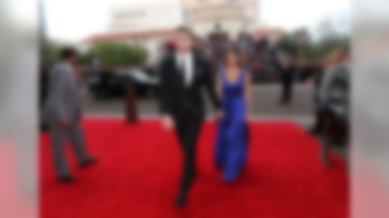 Green Bay Packers quarterback Aaron Rodgers and Olivia Munn arrive to the 4th Annual NFL Honors awards show at the Phoenix Symphony Hall on Saturday, January 31, 2015 in Phoenix, AZ. (Perry Knotts/NFL)