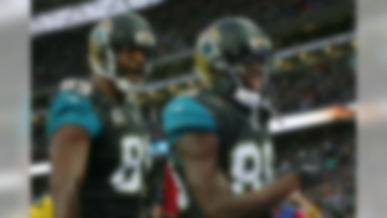 Jacksonville Jaguars wide receiver Allen Hurns (88), right, celebrates with tight end Marcedes Lewis (89) after catching the ball for a touchdown during the NFL game between Buffalo Bills and Jacksonville Jaguars at Wembley Stadium in London,  Sunday, Oct. 25, 2015. (AP Photo/Tim Ireland)