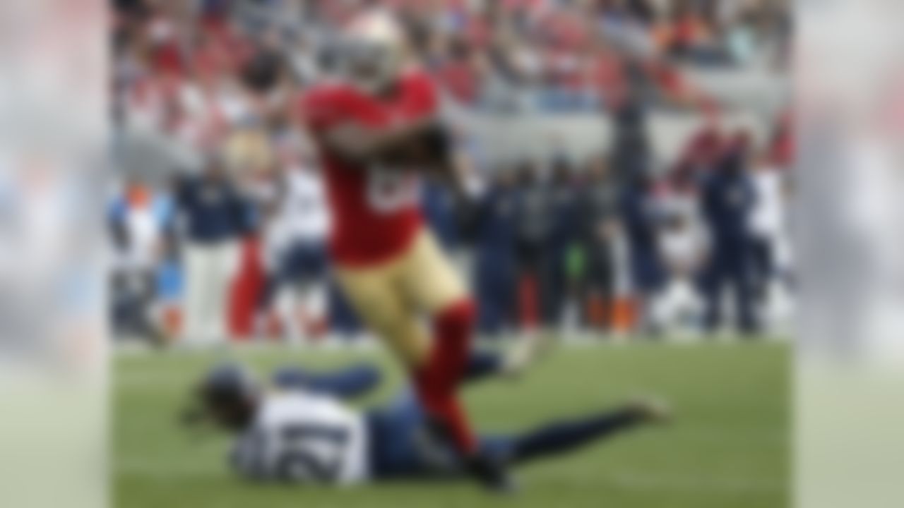 San Francisco 49ers wide receiver Anquan Boldin (81) catches a touchdown pass against St. Louis Rams cornerback Janoris Jenkins (21) during the first half of an NFL football game in Santa Clara, Calif., Sunday, Jan. 3, 2016. (AP Photo/Tony Avelar)