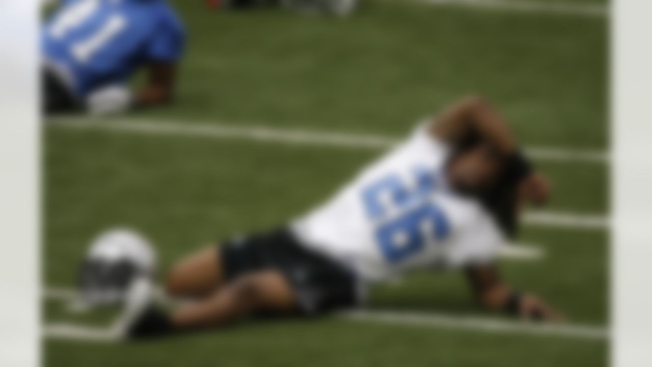 ALLEN PARK, MI - MAY 01: Louis Delmas #26 of the Detroit Lions stretches during rookie orientation camp at the Detroit Lions Headquarters and Training Facility on May 1, 2009 in Allen Park, Michigan.  (Photo by Gregory Shamus/Getty Images)