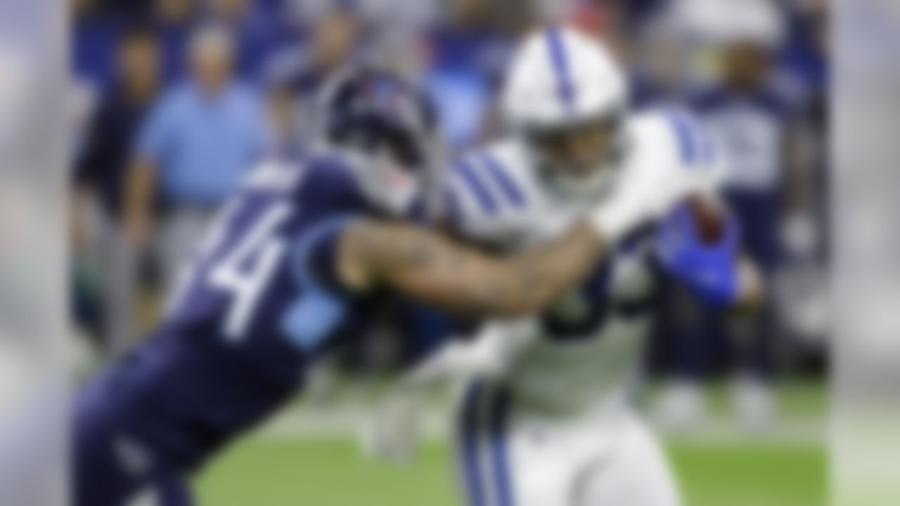 Indianapolis Colts running back Jonathan Williams (33) is tackled by Tennessee Titans outside linebacker Kamalei Correa (44) during the first half of an NFL football game in Indianapolis, Sunday, Dec. 1, 2019. (AP Photo/Darron Cummings)