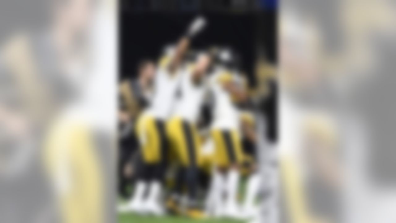 Pittsburgh Steelers celebrate an interception in the first half of an NFL football game against the New Orleans Saints in New Orleans, Sunday, Dec. 23, 2018. (AP Photo/Bill Feig)