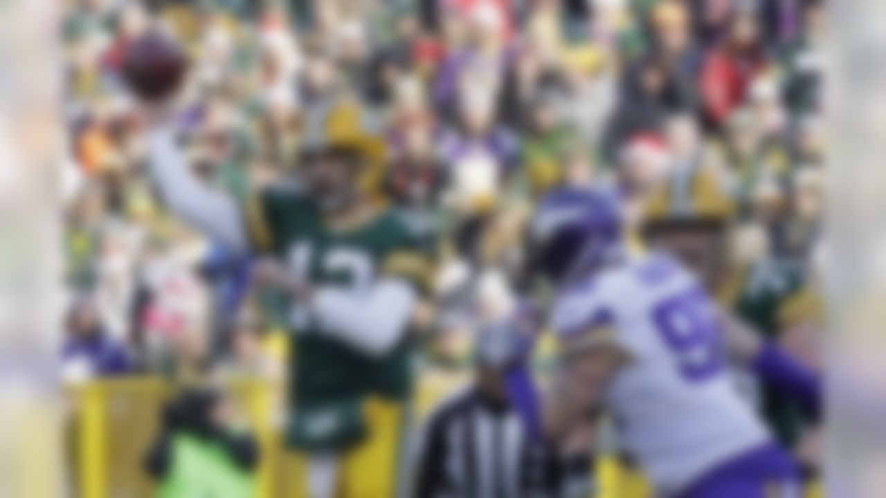 Green Bay Packers' Aaron Rodgers throws during the first half of an NFL football game against the Minnesota Vikings Saturday, Dec. 24, 2016, in Green Bay, Wis. (AP Photo/Morry Gash)