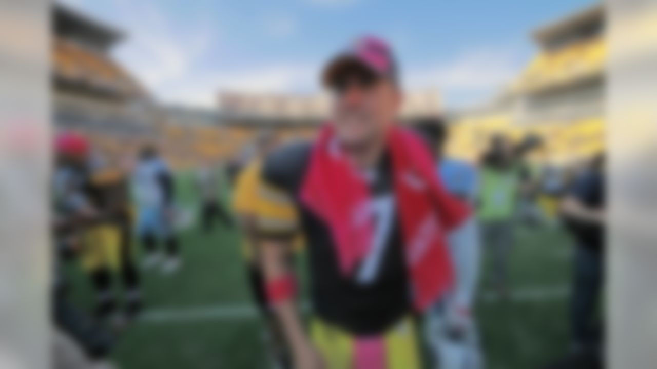 Pittsburgh Steelers quarterback Ben Roethlisberger walks off the field after the Steelers' 38-17 win over the Tennessee Titans in an NFL football game in Pittsburgh, Sunday, Oct. 9, 2011. Roethlisberger threw five touchdown passes. (AP Photo/Gene J. Puskar)