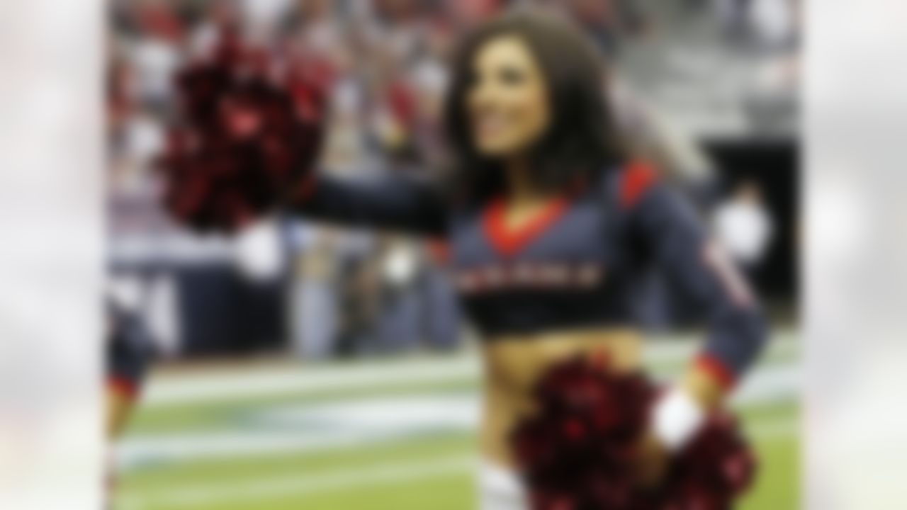 Houston Texans cheerleader performs against the Cincinnati Bengals during the third quarter of the AFC Wild Card playoff game at Reliant Stadium. The Texans defeated the Bengals 19-13. (Brett Davis/US Presswire)