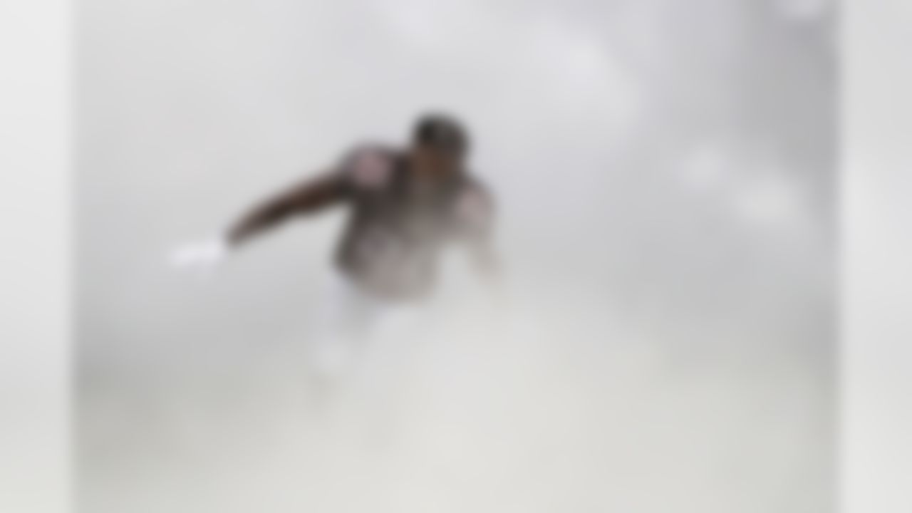 Atlanta Falcons cornerback Desmond Trufant (21) enters the field before the first half of an NFL football game between the Atlanta Falcons and the Tennessee Titans, Sunday, Sept. 29, 2019, in Atlanta. (AP Photo/John Bazemore)