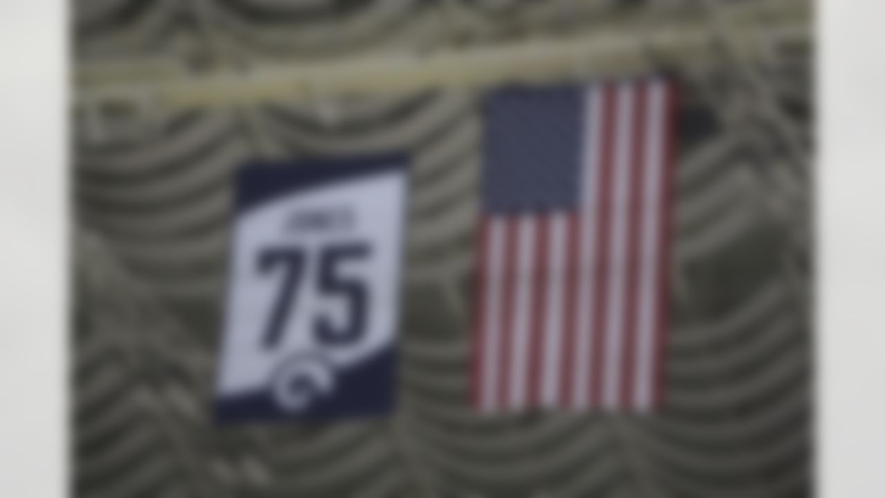 Former Rams defensive end David "Deacon" Jones number hangs from the rafters during a ceremony to retire his number before the start of an NFL football game between the St. Louis Rams and Green Bay Packers Sunday, Sept. 27, 2009, in St. Louis. (AP Photo/Jeff Roberson)