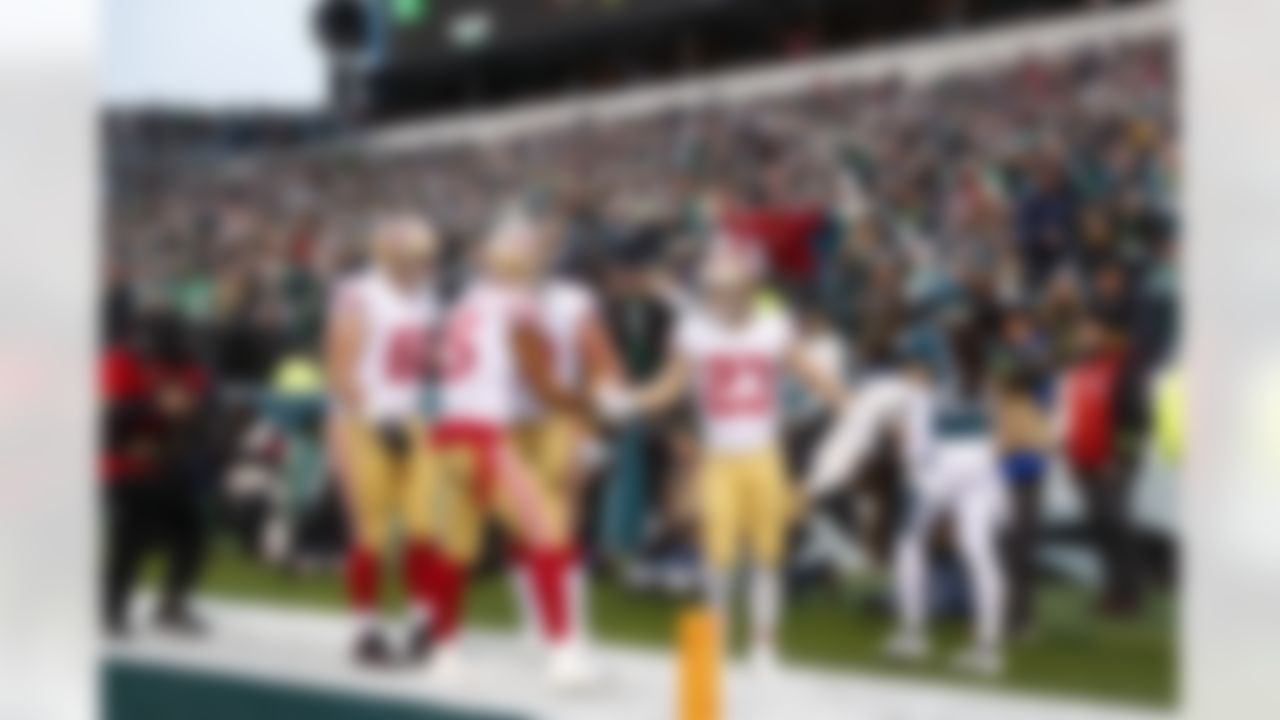 San Francisco 49ers running back Christian McCaffrey (23) celebrates a touchdown during an NFL Conference Championship playoff game against the Philadelphia Eagles on Sunday, January 29, 2023 in Philadelphia, Pennsylvania.