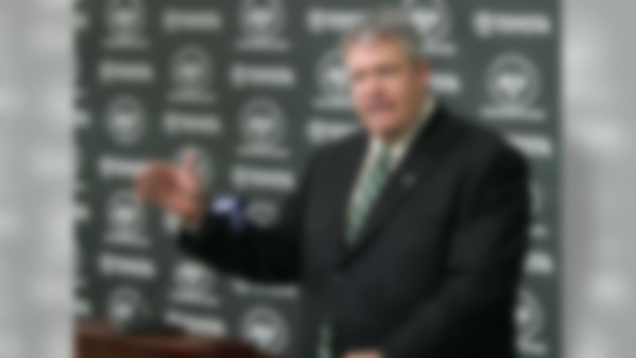 Rex Ryan immediately makes a name for himself when he became coach of the Jets in 2009. Most notably, Ryan said he wasn't there to "kiss the rings" of coach Belichick. (AP Photo/Mike Derer)