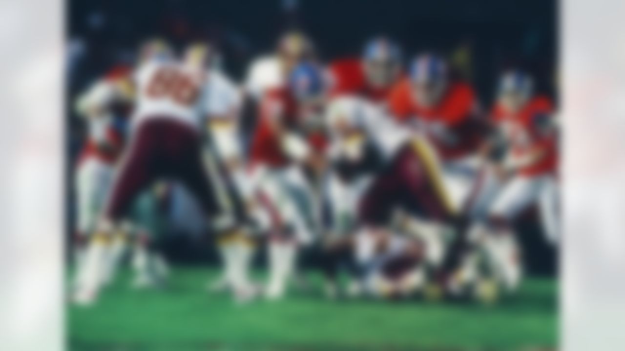 Washington Redskins running back Timmy Smith (36) runs into the during Super Bowl XXII between the Washington Redskins and the Denver Broncos on January 31, 1988 in San Diego, CA. (AP Photo/Paul Spinelli)