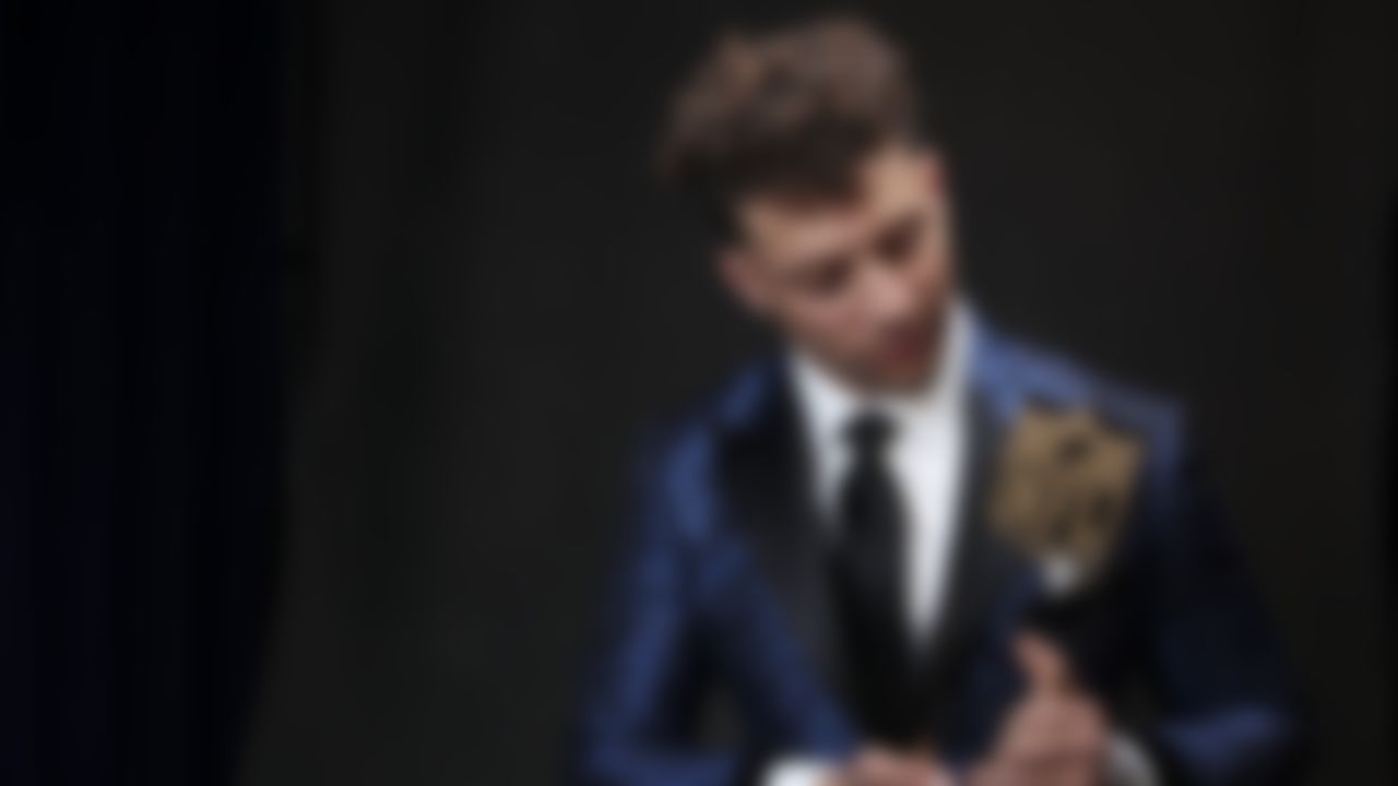 Kansas City Chiefs quarterback Patrick Mahomes poses for a photo backstage after winning the AP Offensive Player of the Year award during the NFL Honors awards show, Saturday, Feb. 2, 2019 in Atlanta.