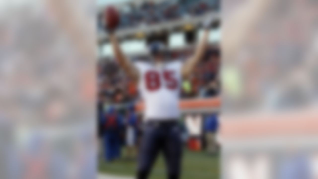 Houston Texans tight end Joel Dreessen (85) celebrates after catching a touchdown pass against the Cincinnati Bengals in the second half of an NFL football game on Sunday, Dec. 11, 2011, in Cincinnati. (AP Photo/David Kohl)