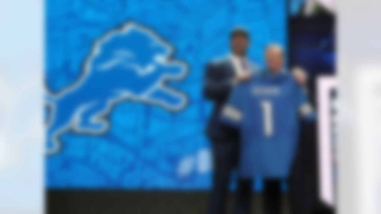 Ohio State offensive tackle Taylor Decker holds up his jersey with NFL Commissioner Roger Goodell after being drafted by the Detroit Lions during the 2016 NFL Draft at the Auditorium Theatre on Thursday, April 28, 2016 in Chicago. (Perry Knotts/NFL)