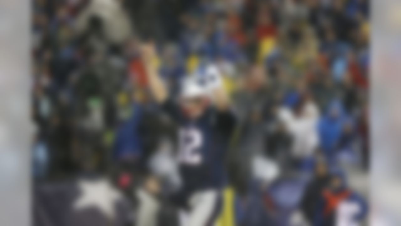 New England Patriots quarterback Tom Brady (12) reacts after a touchdown against the Indianapolis Colts during the NFL football AFC Championship game between the New England Patriots and Indianapolis Colts Sunday, Jan. 18, 2015, in Foxborough, Mass. (Aaron M. Sprecher/NFL)