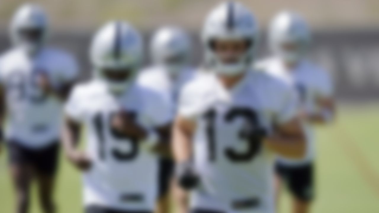 Las Vegas Raiders wide receiver Hunter Renfrow (13) warms up during NFL football practice Wednesday, June 2, 2021, in Henderson, Nev.
