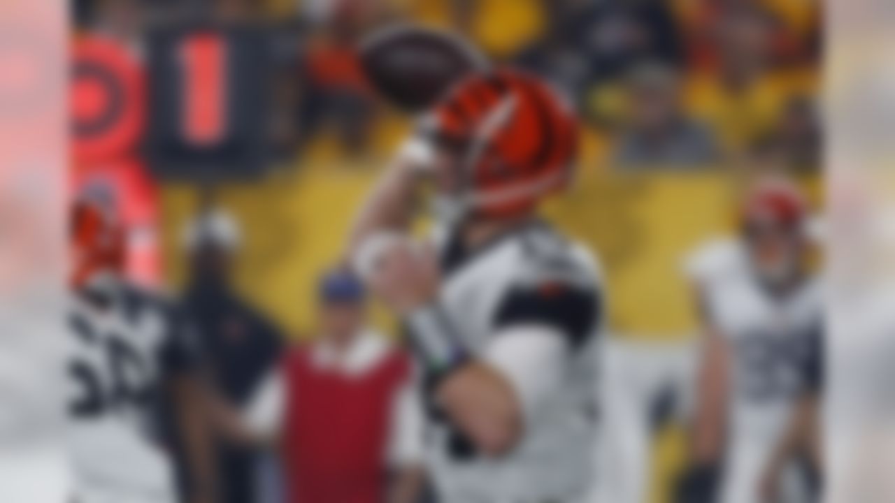Cincinnati Bengals quarterback Andy Dalton (14) passes during the first half of an NFL football game against the Pittsburgh Steelers in Pittsburgh, Monday, Sept. 30, 2019. (AP Photo/Tom Puskar)