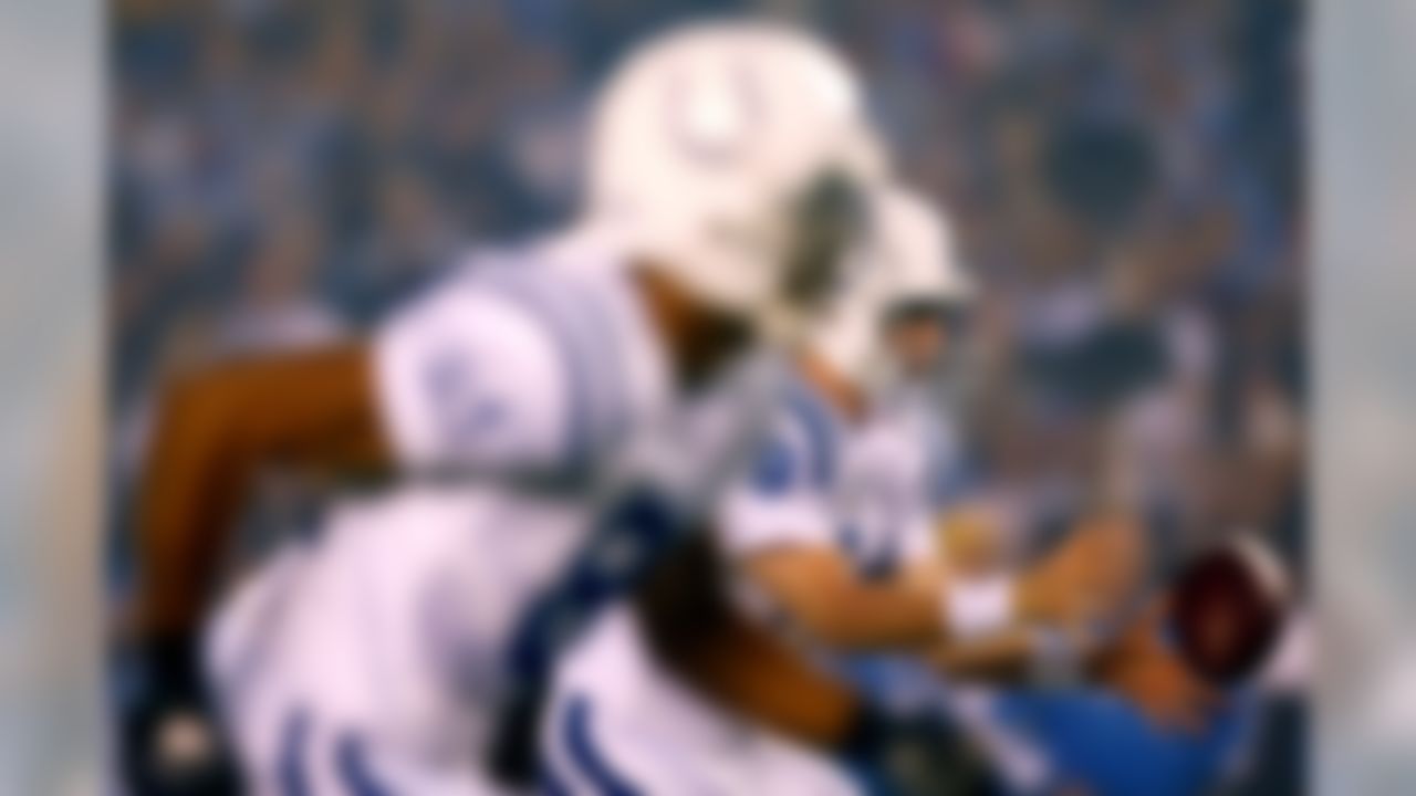 SAN DIEGO - NOVEMBER 11:  Quarterback Peyton Manning #18 of the Indianapolis Colts in action at the line of scrimmage against the San Diego Chargers during the first half of their NFL game on November 11, 2007 at Qualcomm Stadium in San Diego, California.  (Photo by Donald Miralle/Getty Images)