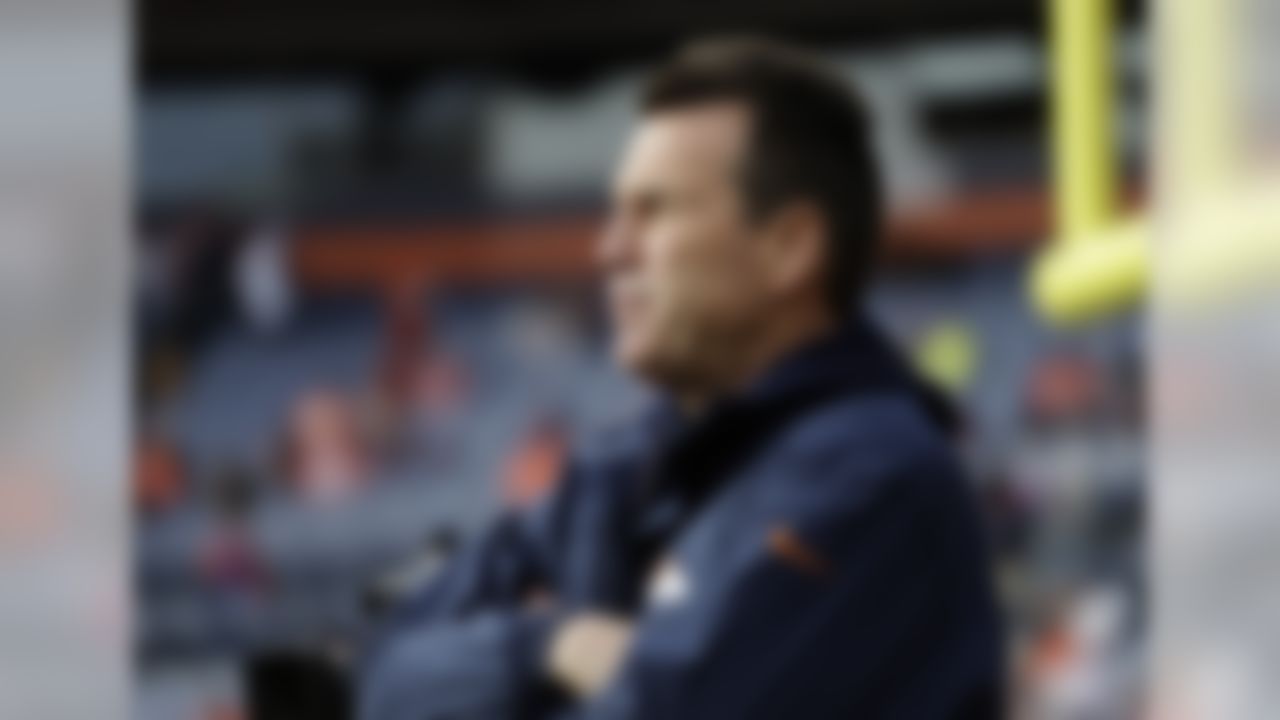 Denver Broncos coach Gary Kubiak stands on the field during warmups before the team's NFL football game against the Oakland Raiders, Sunday, Jan. 1, 2017, in Denver. (AP Photo/Jack Dempsey)