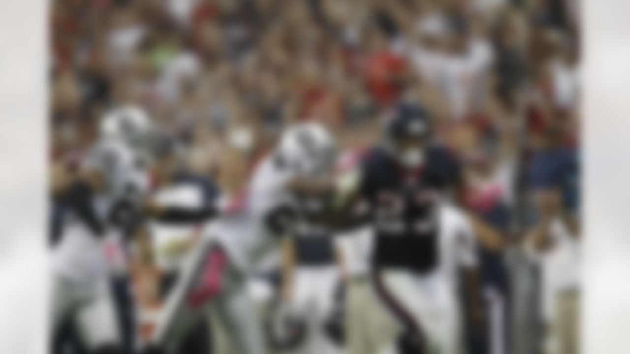 Arian Foster (23) of the Houston Texans runs against DeMarcus Van Dyke (23) of the Oakland Raiders at Reliant Stadium on October 9, 2011 in Houston, Texas. (Aaron M. Sprecher/NFL)