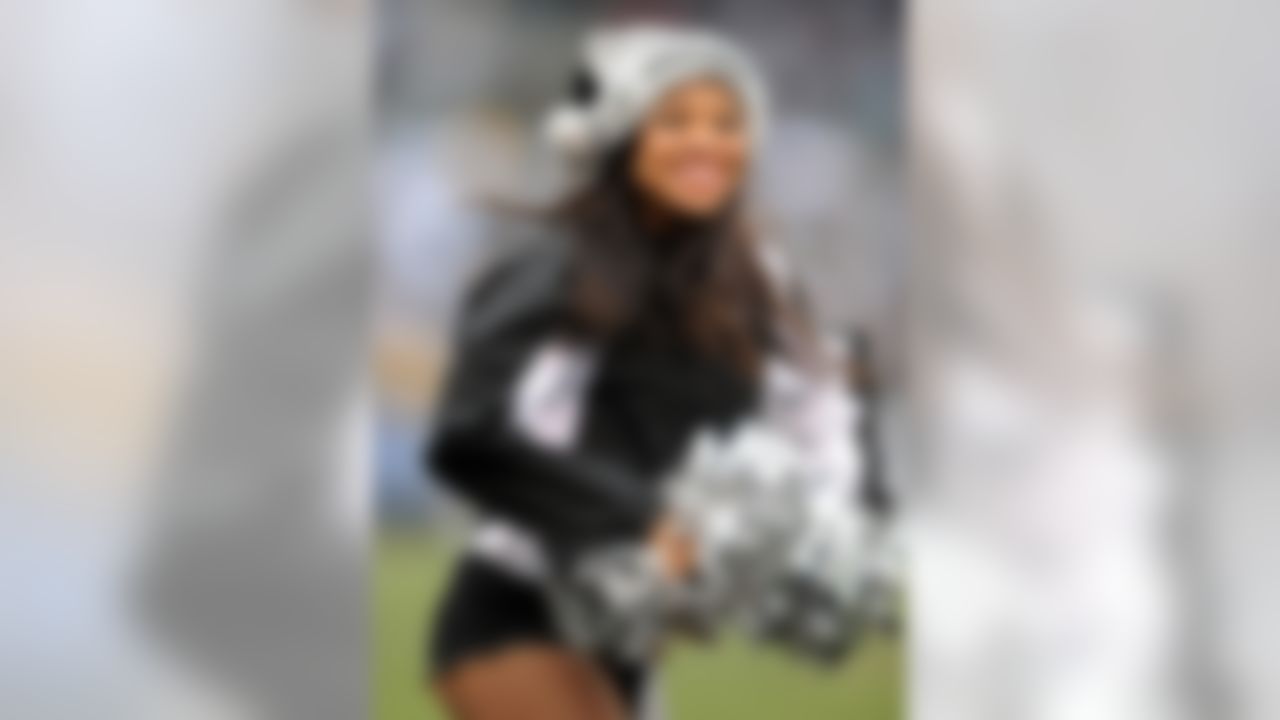 Dec 21, 2008; Oakland, CA, USA; An Oakland Raiders Raiderette cheerleader performs a Christmas routine during the game against the Houston Texans at the Oakland-Alameda County Coliseum. (Photo by Kirby Lee/Image of Sport)