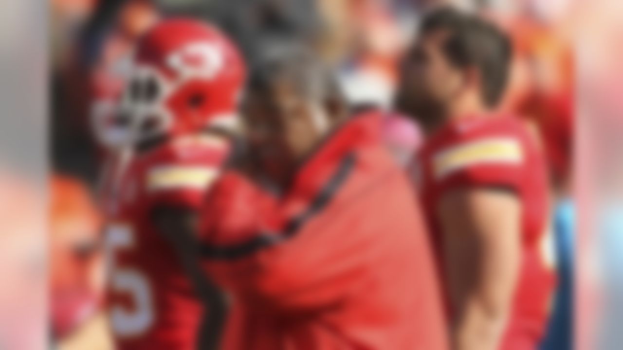 Kansas City Chiefs coach Romeo Crennel wipes his eyes on an emotional Sunday at Arrowhead Stadium. (AP Photo/Colin E. Braley)