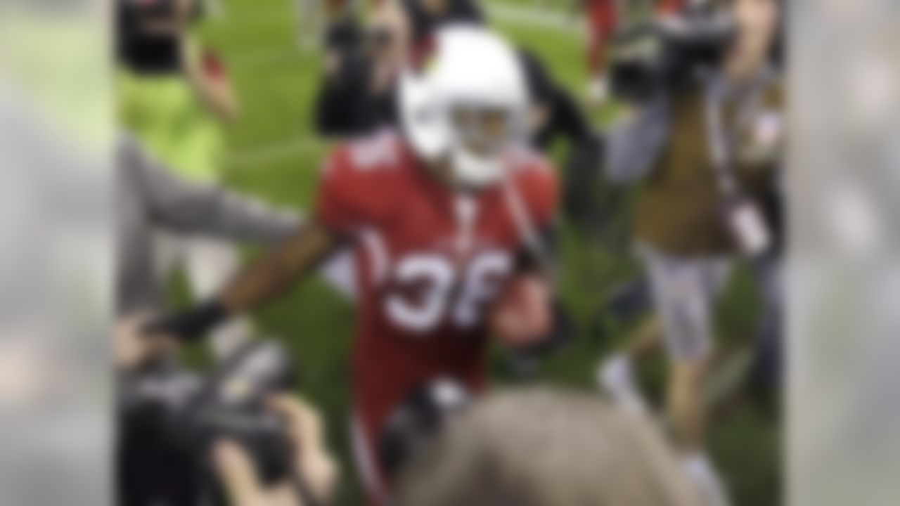 Arizona Cardinals running back LaRod Stephens-Howling (36) runs off the field after scoring the game-winning touchdown during overtime of an NFL football game against the Dallas Cowboys, Sunday, Dec. 4, 2011, in Glendale, Ariz. The Cardinals won 19-13. (AP Photo/Paul Connors)