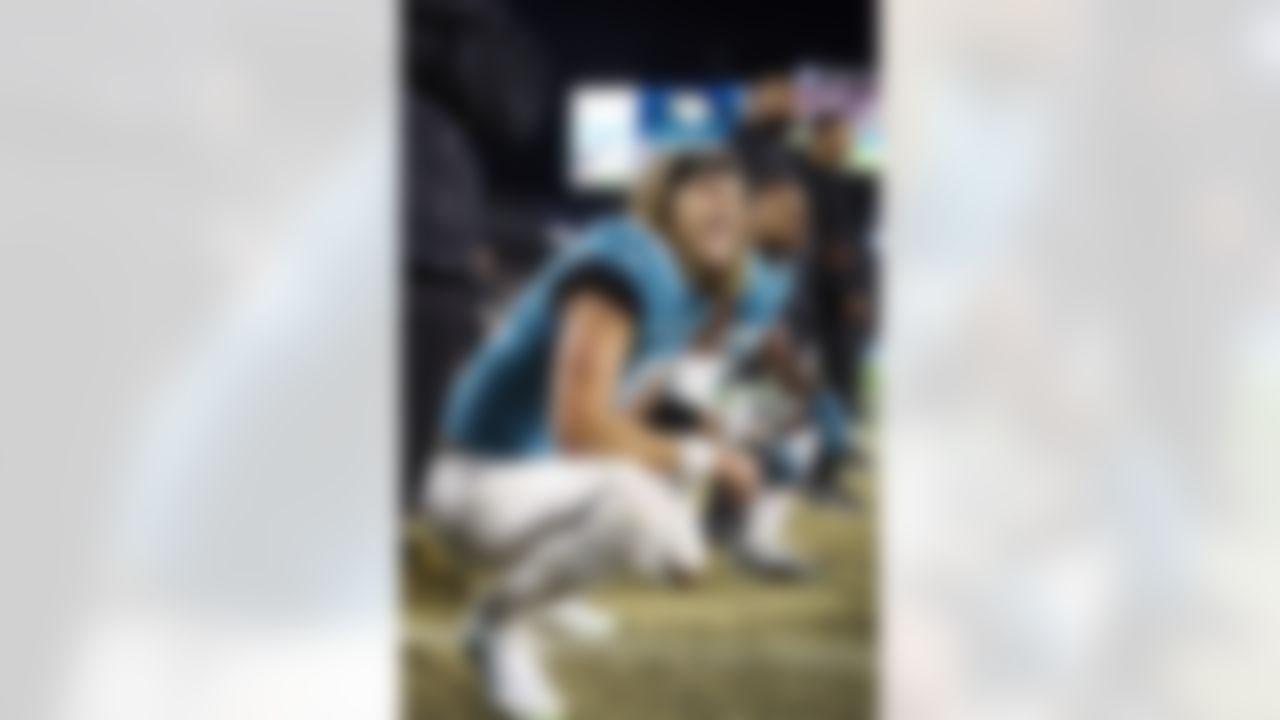 Jacksonville Jaguars quarterback Trevor Lawrence (16) looks on during an NFL Super Wild Card Weekend playoff game against the Los Angeles Chargers on Saturday, January 14, 2023 in Jacksonville, Florida.