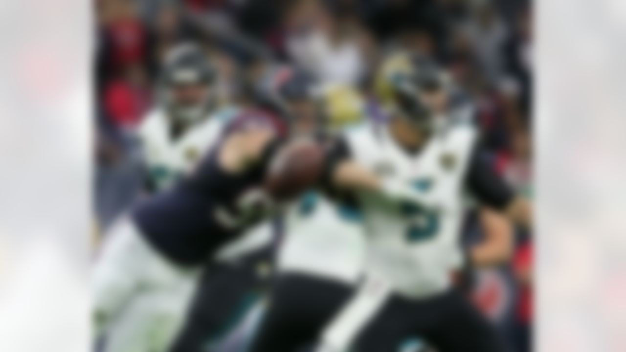 Houston Texans defensive end J.J. Watt (99) rushes the passer and causes a fumble by Jacksonville quarterback Blake Bortles (5) in action  on Sunday December 28, 2014 in Houston, Texas   (Damian Strohmeyer via AP)