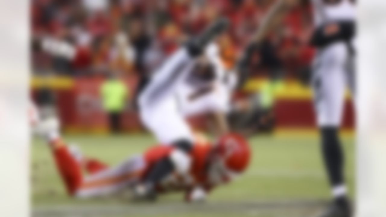 Cincinnati Bengals wide receiver Ja'Marr Chase (1) attempts a catch during an NFL Conference Championship playoff game against the Kansas City Chiefs on Sunday, January 29, 2023 in Kansas City, Missouri.
