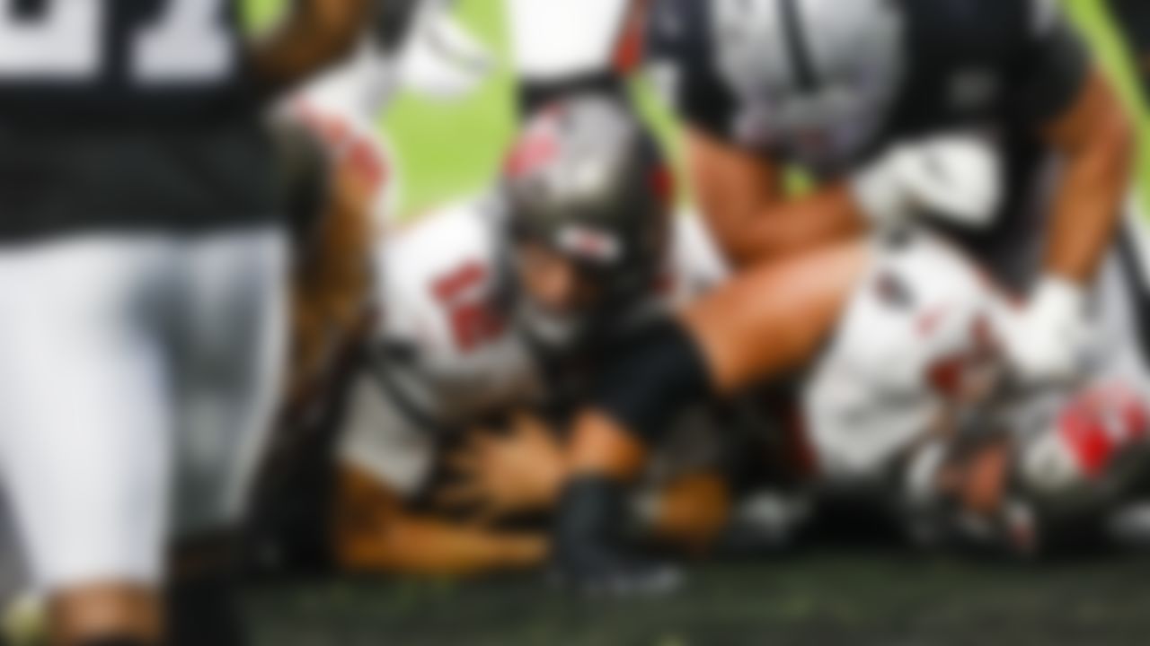 Tampa Bay Buccaneers quarterback Tom Brady (12) scores a touchdown during a game against the Las Vegas Raiders.