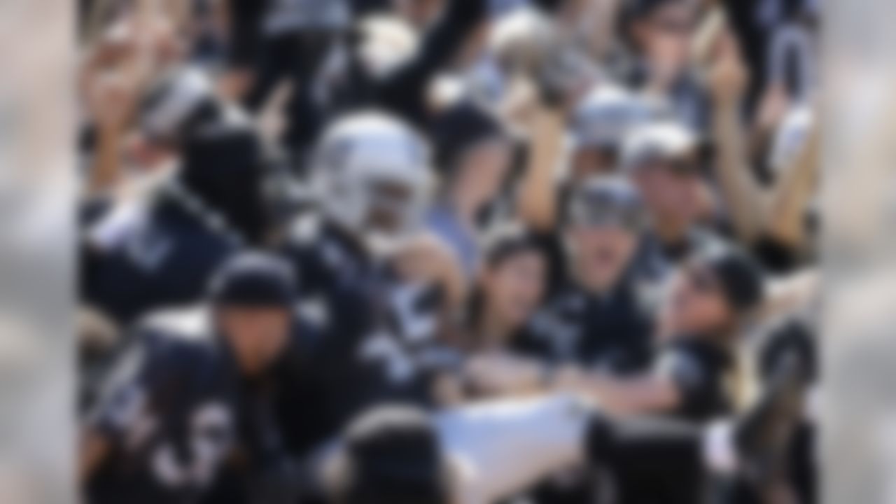 Oakland Raiders fullback Marcel Reece (45) celebrates with fans after scoring on an 11-yard touchdown run during the first quarter of an NFL football game against the Jacksonville Jaguars, Sunday, Sept. 15, 2013, in Oakland, Calif. (AP Photo/Ben Margot)