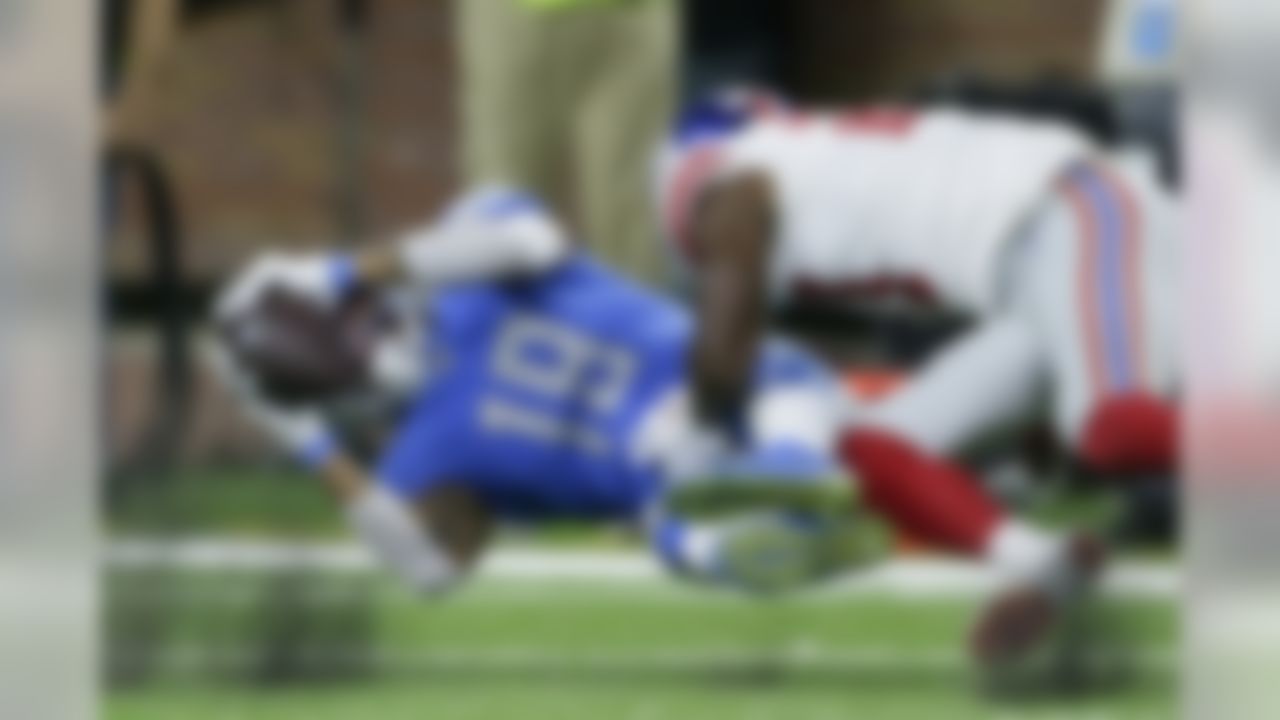 Detroit Lions wide receiver Kenny Golladay (19) is tackled by New York Giants cornerback Deandre Baker during the second half of an NFL football game, Sunday, Oct. 27, 2019, in Detroit.