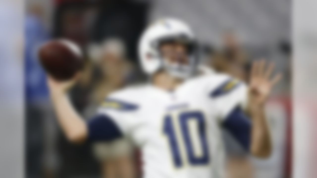 San Diego Chargers' Kellen Clemens throws a pass as he warms up for the team's NFL preseason football game against the Arizona Cardinals on Saturday, Aug. 22, 2015, in Glendale, Ariz. (AP Photo/Ross D. Franklin)